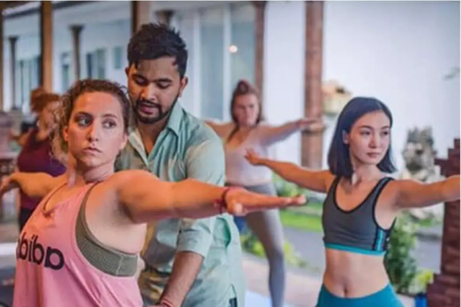 Teacher Teaching Astanga Yoga at Bali Yogshala During Yoga Class